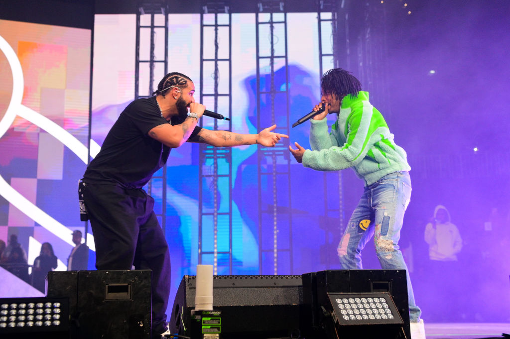 Rapper Drake and Rapper 21 Savage perform onstage