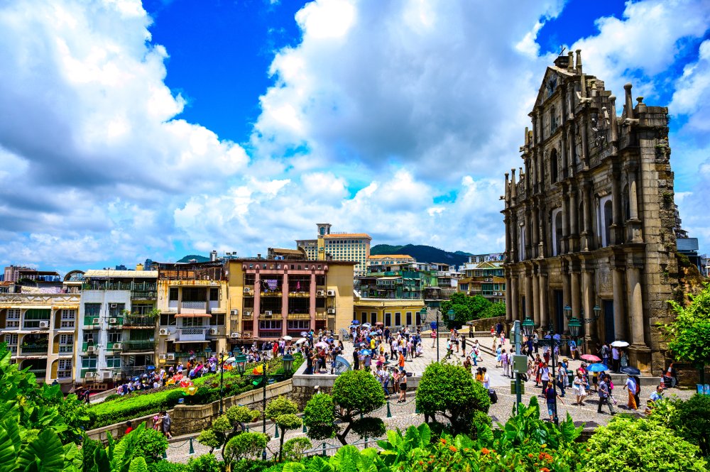 A vibrant outdoor scene captures the Ruins of St. Paul's in Macau