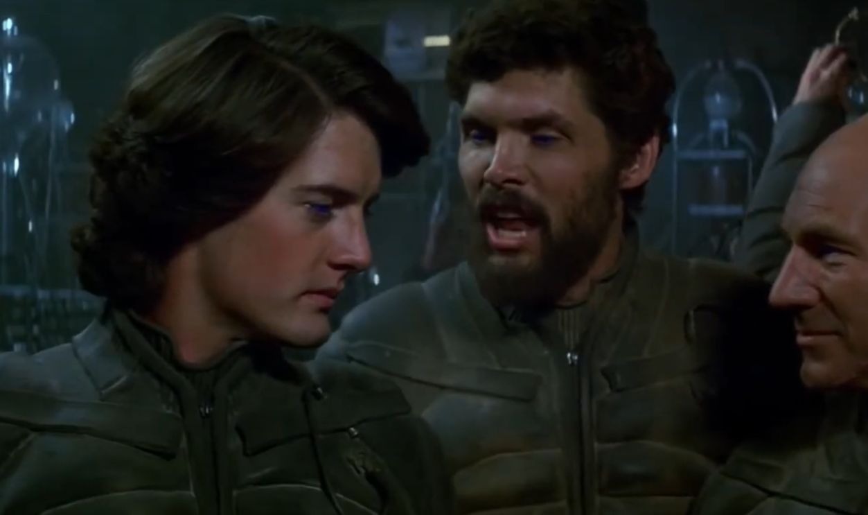 Three people in conversation