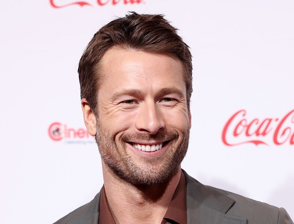 Glen Powell posing for a photo