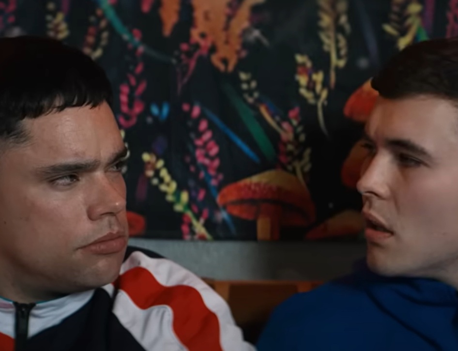 A visually captivating still taken from a pivotal moment in the film Kneecap (2024)