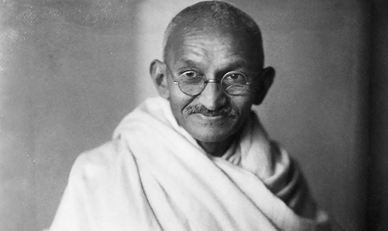 Studio photograph of Mahatma Gandhi
