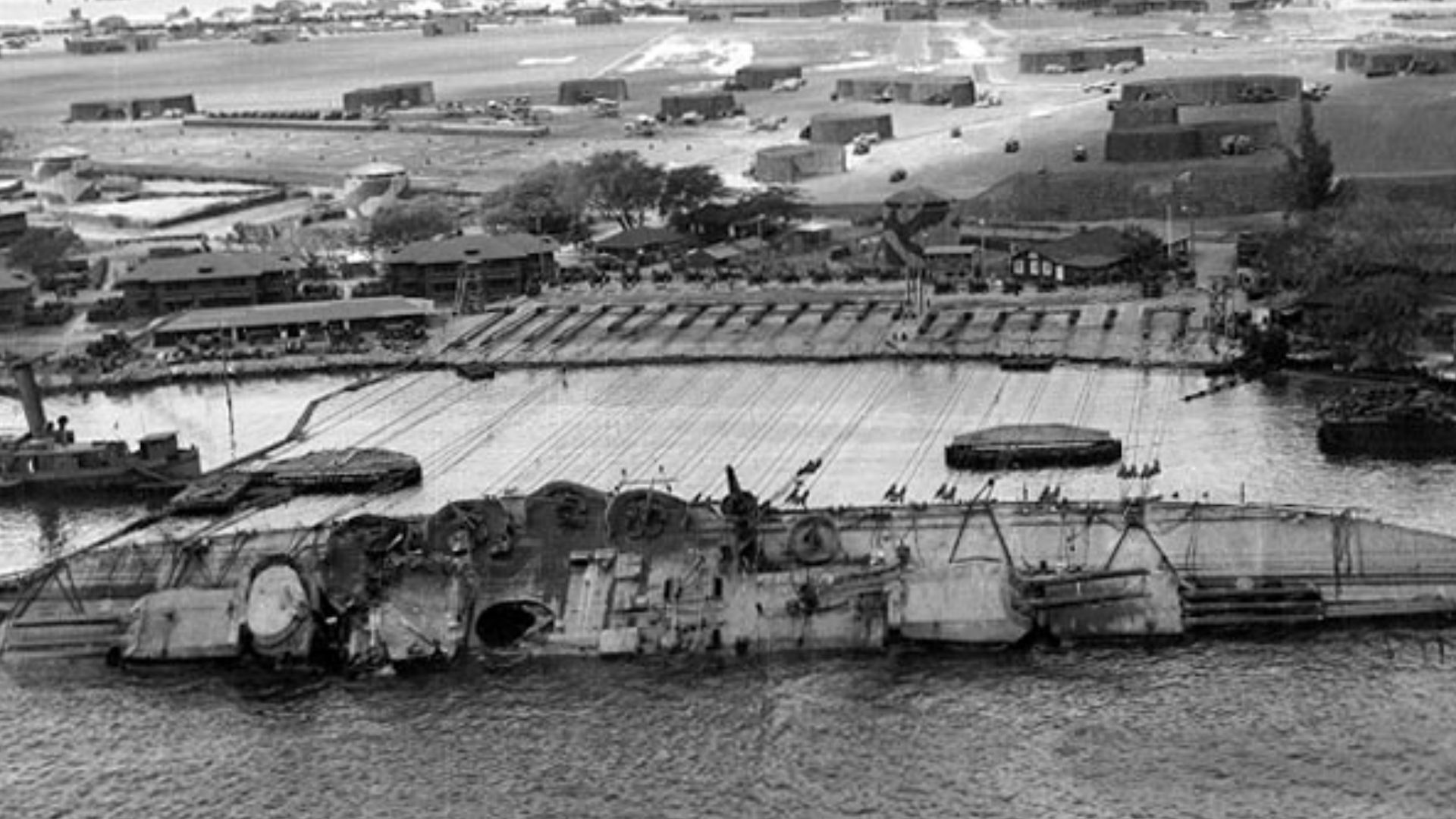 File:Righting of the USS Oklahoma with winches on Ford Island.jpg