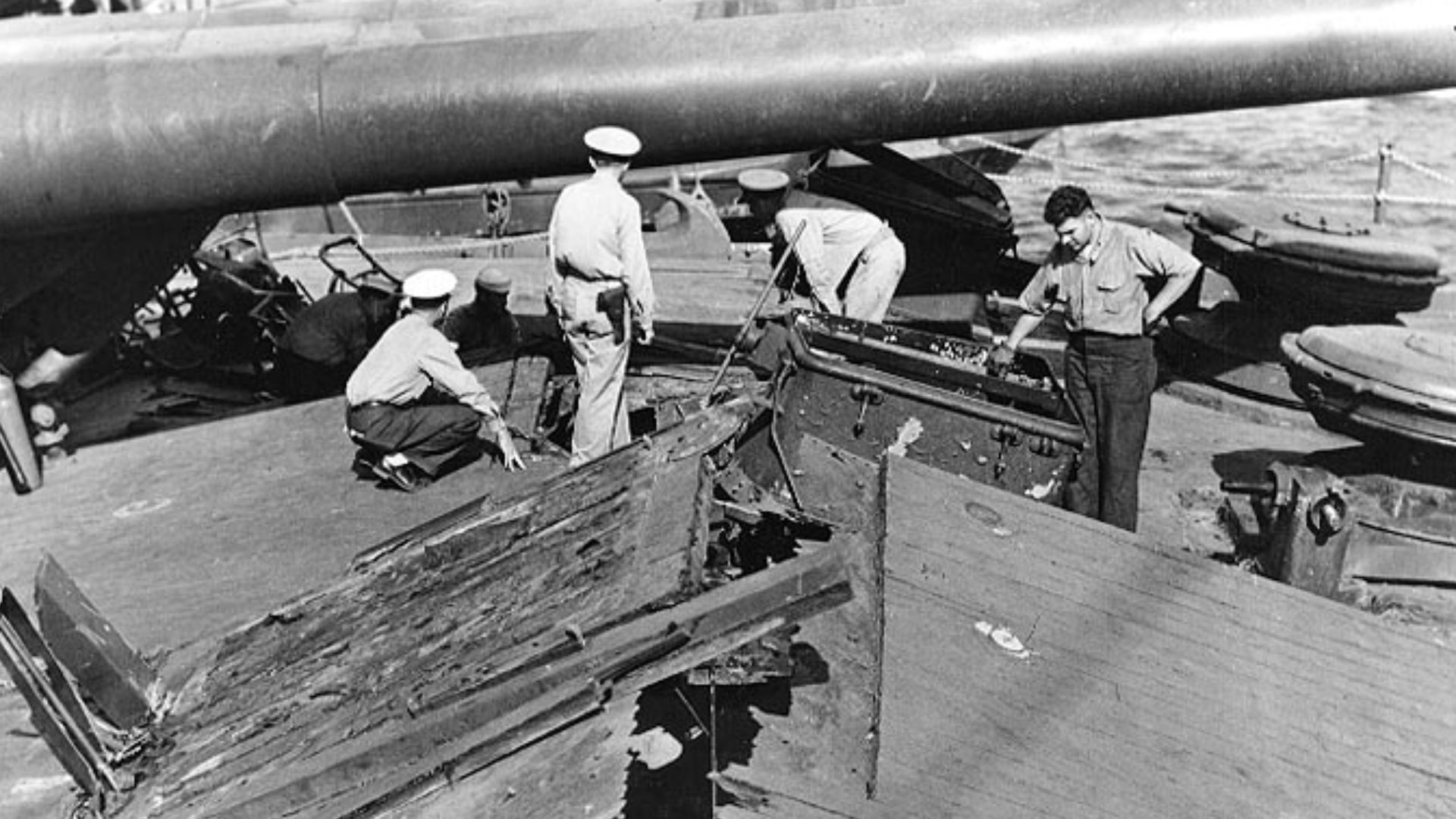File:USS Nevada damage to forecastle deck due to bomb blast'.jpg