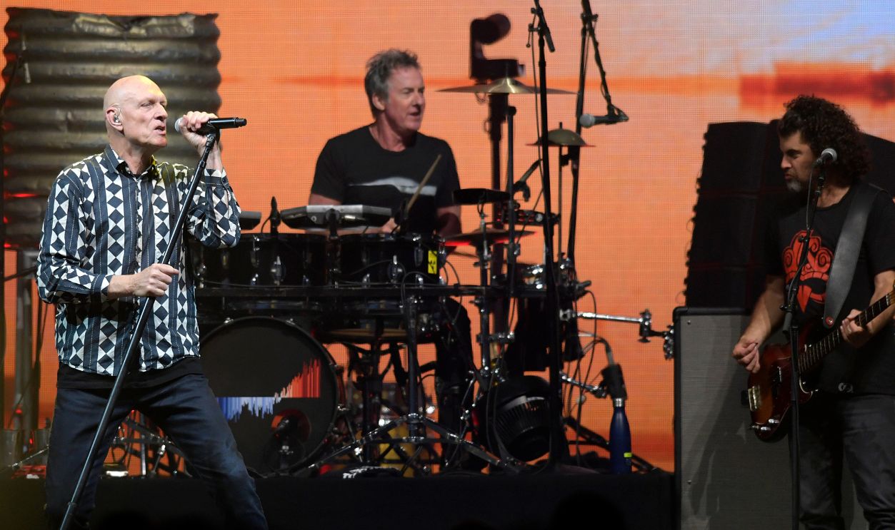 MARCH 27TH:Midnight Oil perform on stage at the Rod Laver Arena on March 27th 2022 in Melbourne Australia.