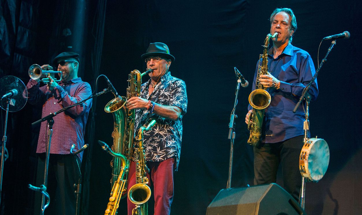 (L-R) Musicians Marvin McFadden, Johnnie Bamont, and Rob Sudduth of Huey Lewis and The News perform on stage at Humphrey's on September 1, 2016 in San Diego, California.