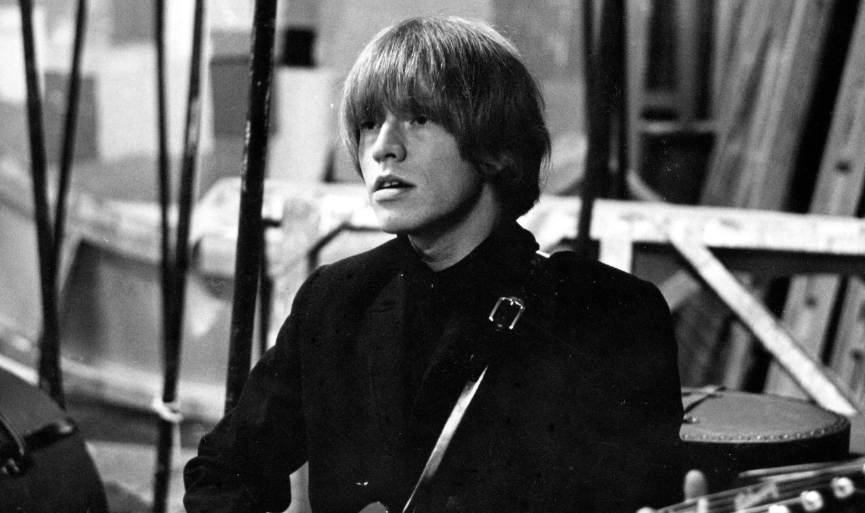 Guitarist Brian Jones of the rock and roll band 'The Rolling Stones' performs onstage in circa 1965.