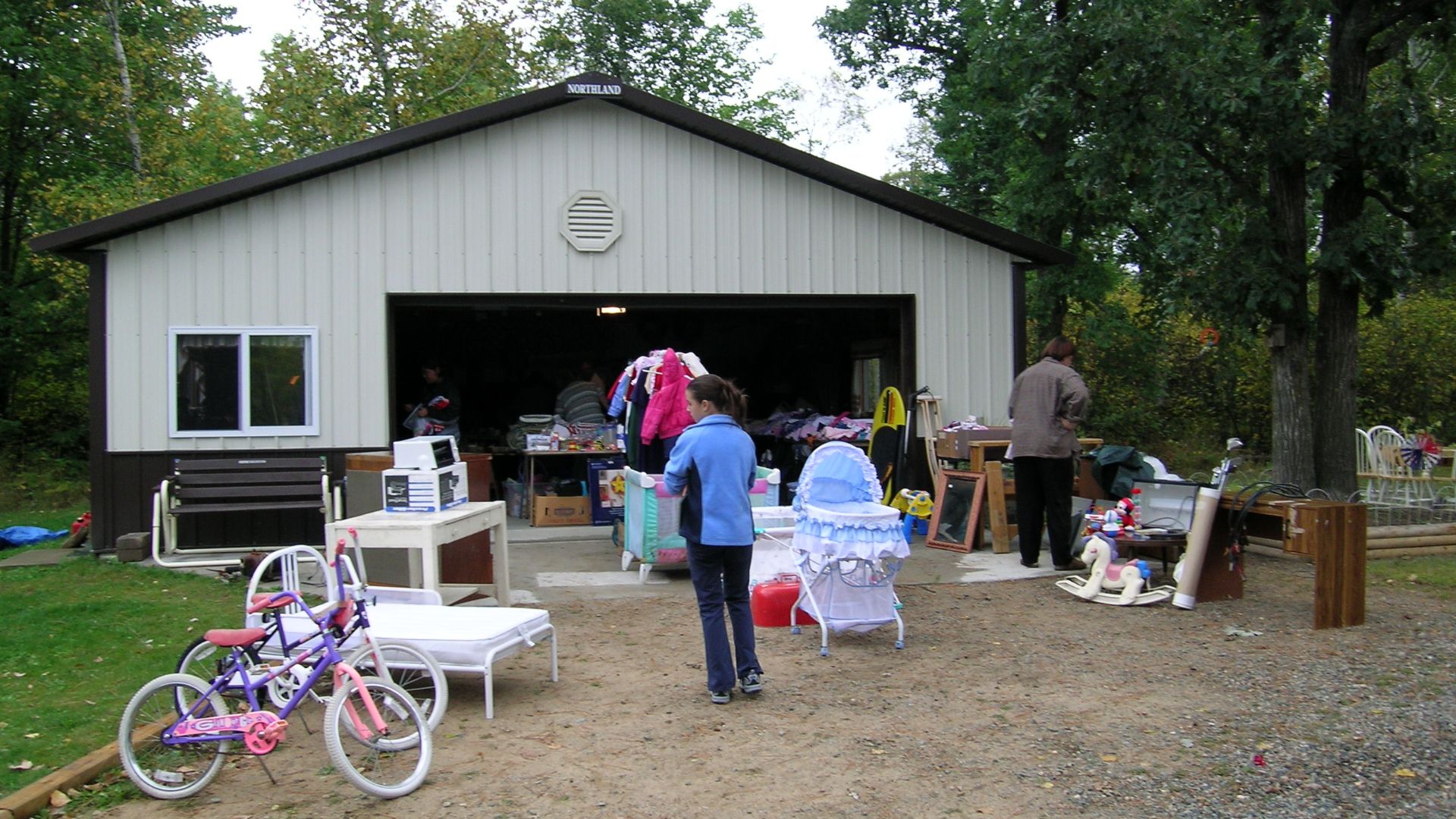 File:Edge of the Wilderness - A Garage Sale on the Edge of the Wilderness - NARA - 7718195.jpeg
