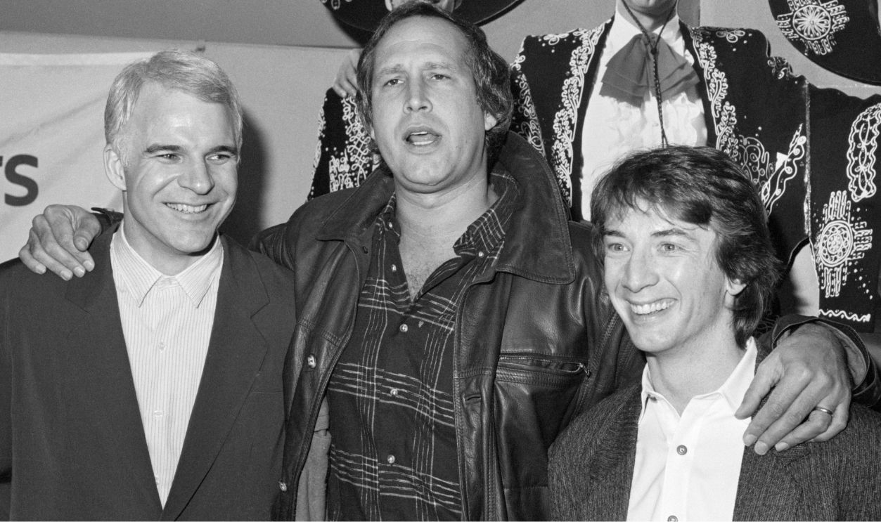 Steve Martin, Chevy Chase and Martin Short stand together at the Motion Picture Academy for the premiere of their film Three Amigos, on December 10, 1986. The premiere will benefit Big Sisters, a non-profit organization offering guidance to troubled girls.