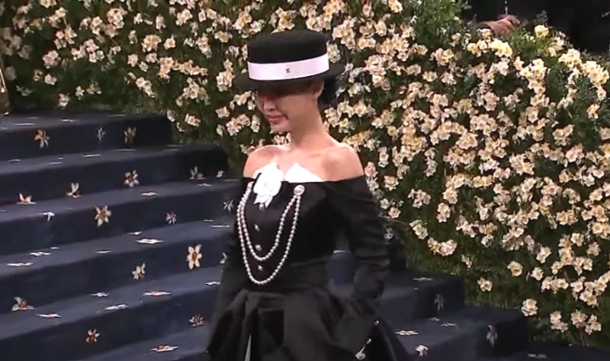 Jennie Kin In Chanel Charm