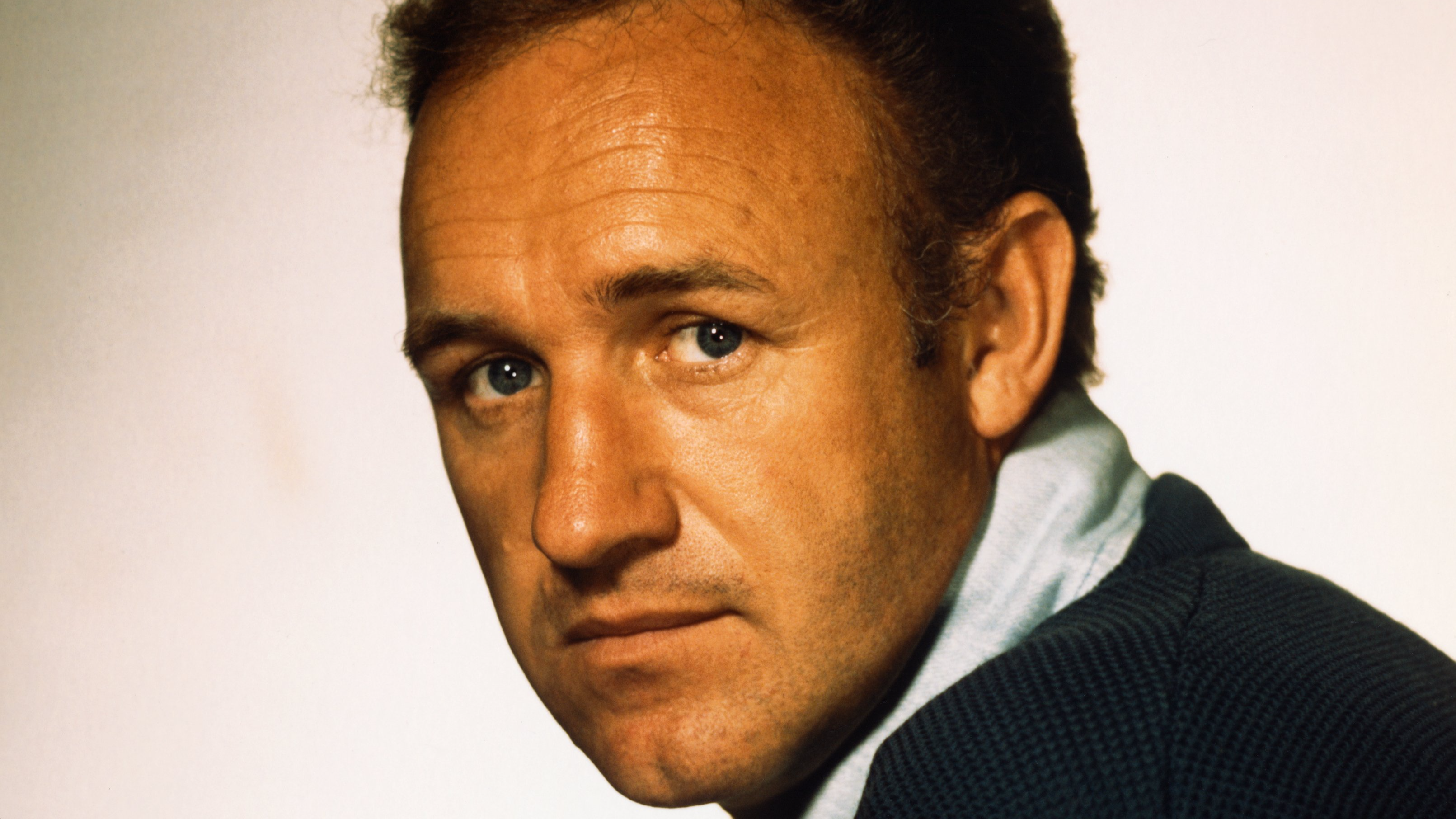 Portrait of Gene Hackman in blue sweater