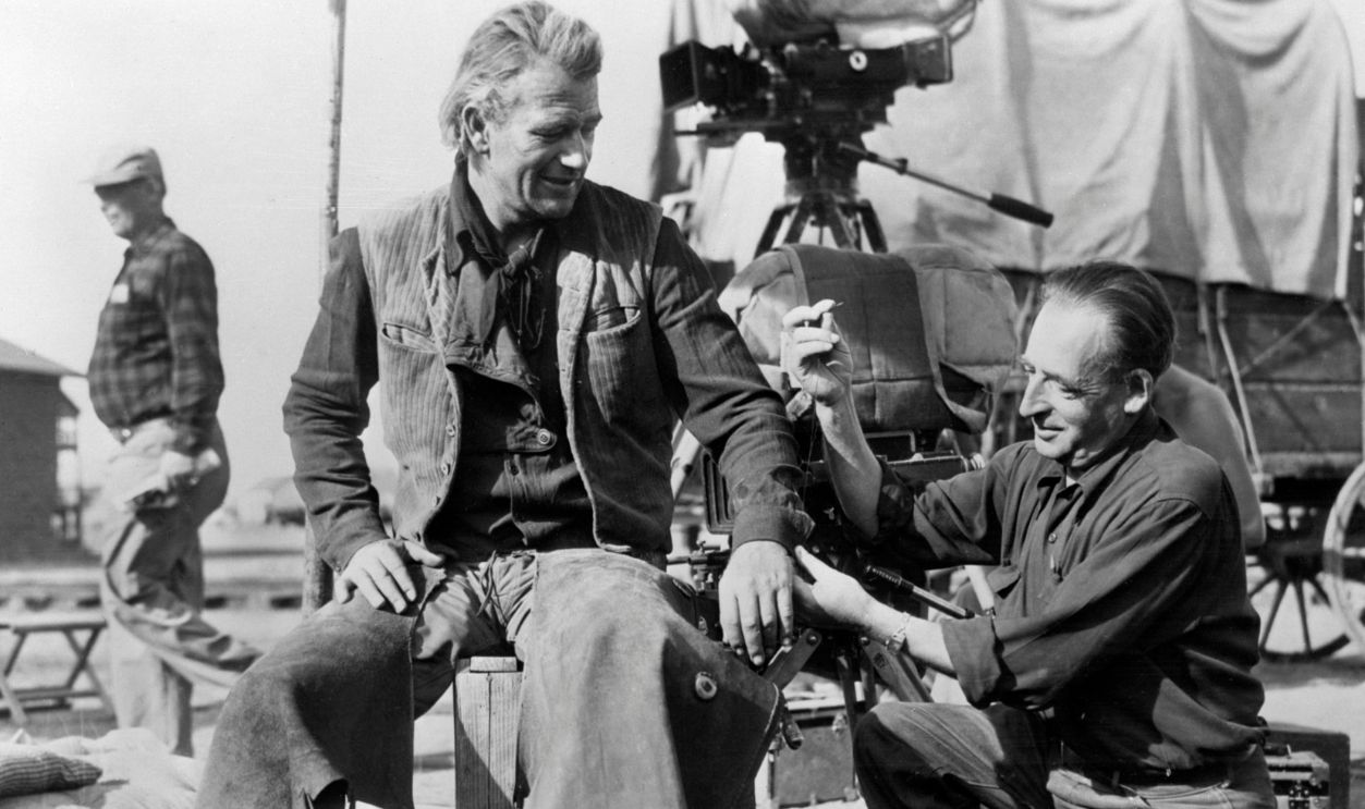 Tailor on Set Mending John Wayne's Shirt