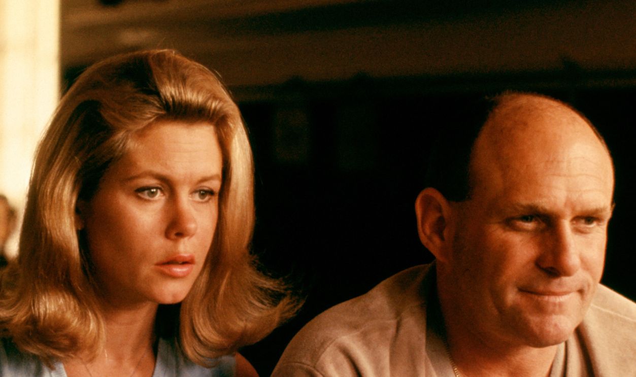 BEVERLY HILLS, CA - 1966: Actress Elizabeth Montgomery (1933-1995) and her husband producer and director William Asher (1921-2012) pose for a portrait at home circa 1966 in Beverly Hills, California. (Photo by Martin Mills/Getty Images)