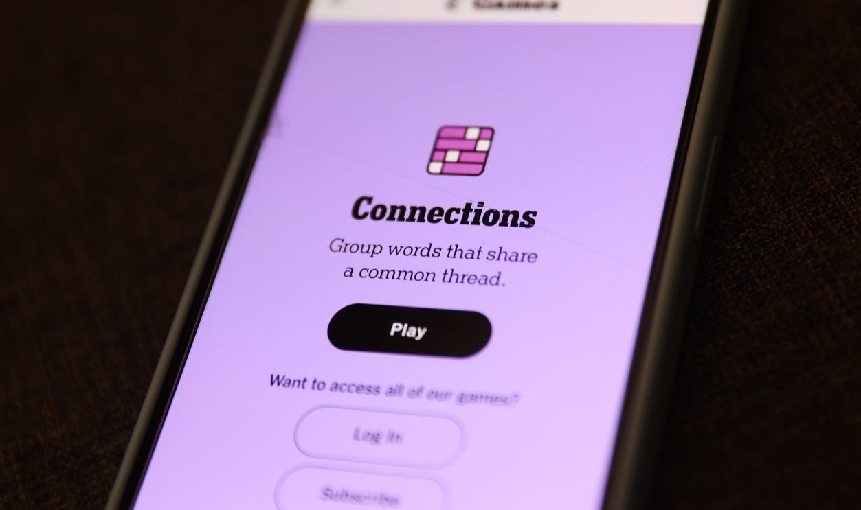 Connections game website displayed on a phone screen is seen in this illustration photo taken in Poland on August 6, 2024.