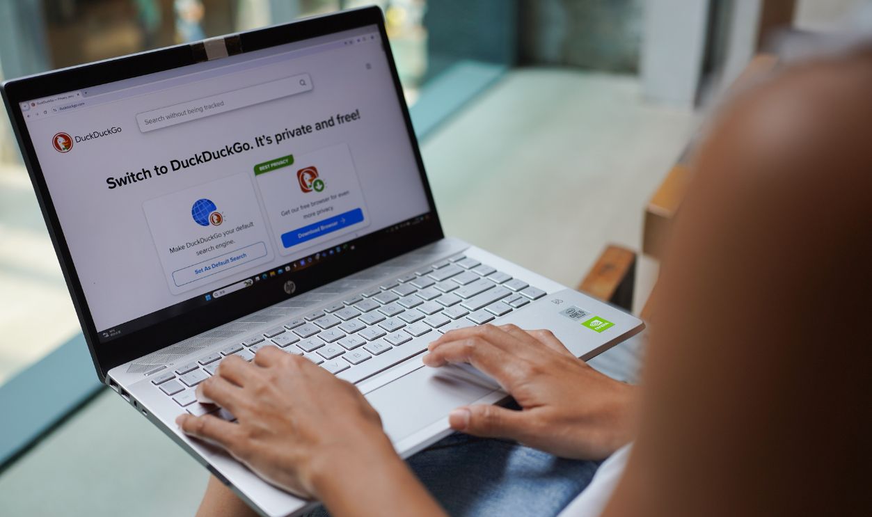 In this photo illustration, A woman browses DuckDuckGo website on her laptop.