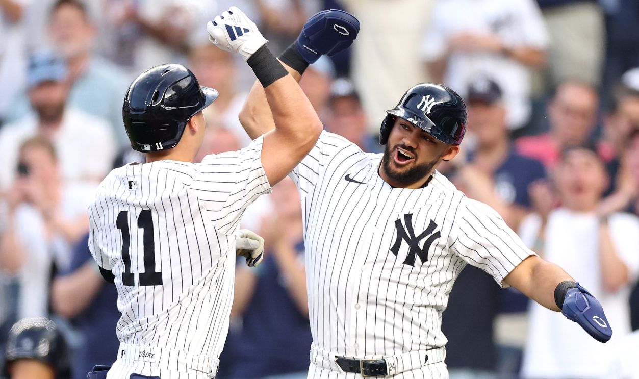 Anthony Volpe #11 of the New York Yankees reacts with Jasson Domínguez #24 after a two-run home run against the Boston Red Sox during the first inning at Yankee Stadium on June 06, 2025 in the Bronx borough of New York City