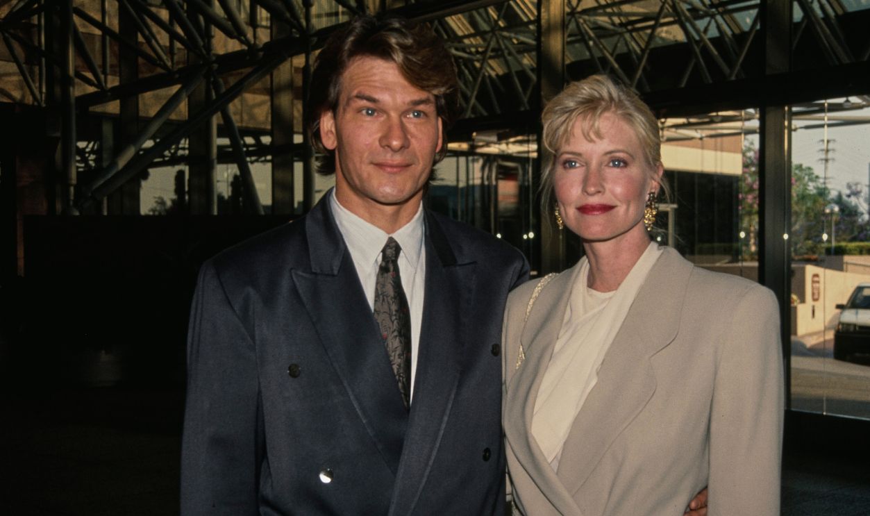 American actor and dancer Patrick Swayze (1952 - 2009) and his wife Lisa Niemi attending an event, circa 1990.