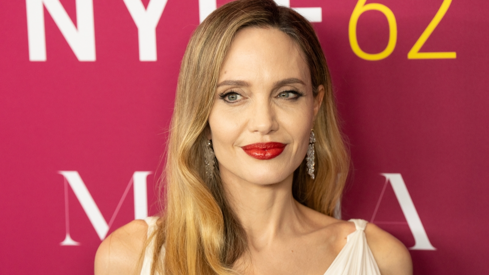 Angelina Jolie wearing vintage Madame Gres dress, Cartier jewlery and Aquazurra shoes