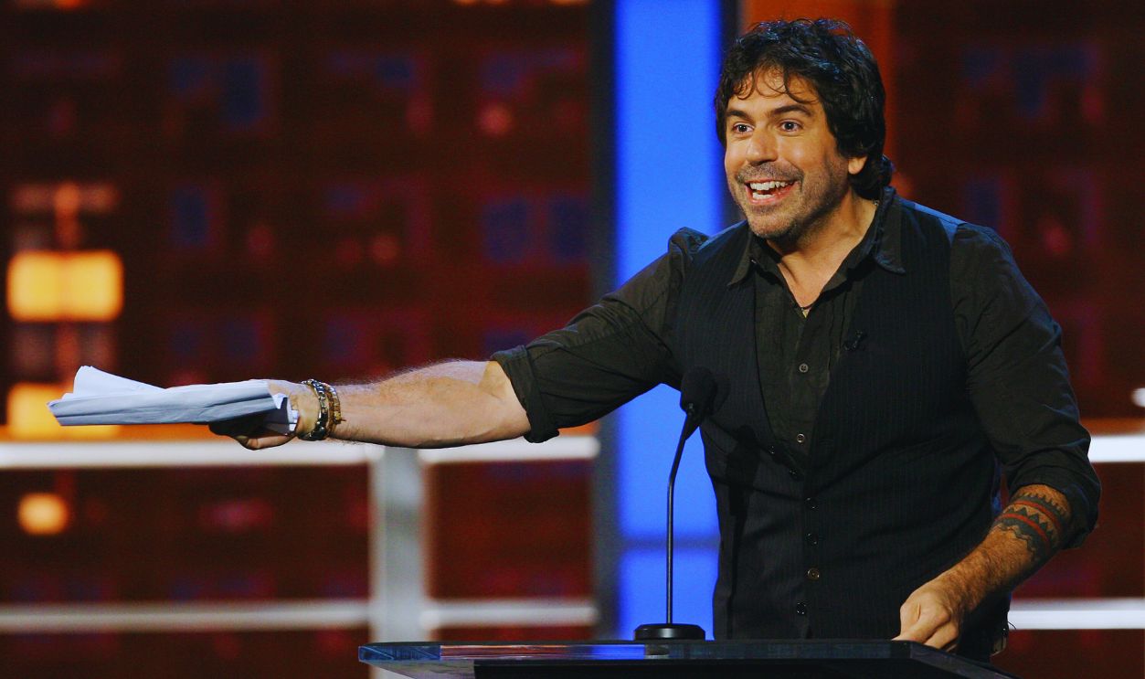 Gettyimages - 82170805, Comedy Central's Roast of Bob Saget - Show LOS ANGELES, CA - AUGUST 03: Comedian Greg Giraldo on stage at the 'Comedy Central Roast Of Bob Saget' on the Warner Brothers Lot on August 3, 2008 in Burbank, California.