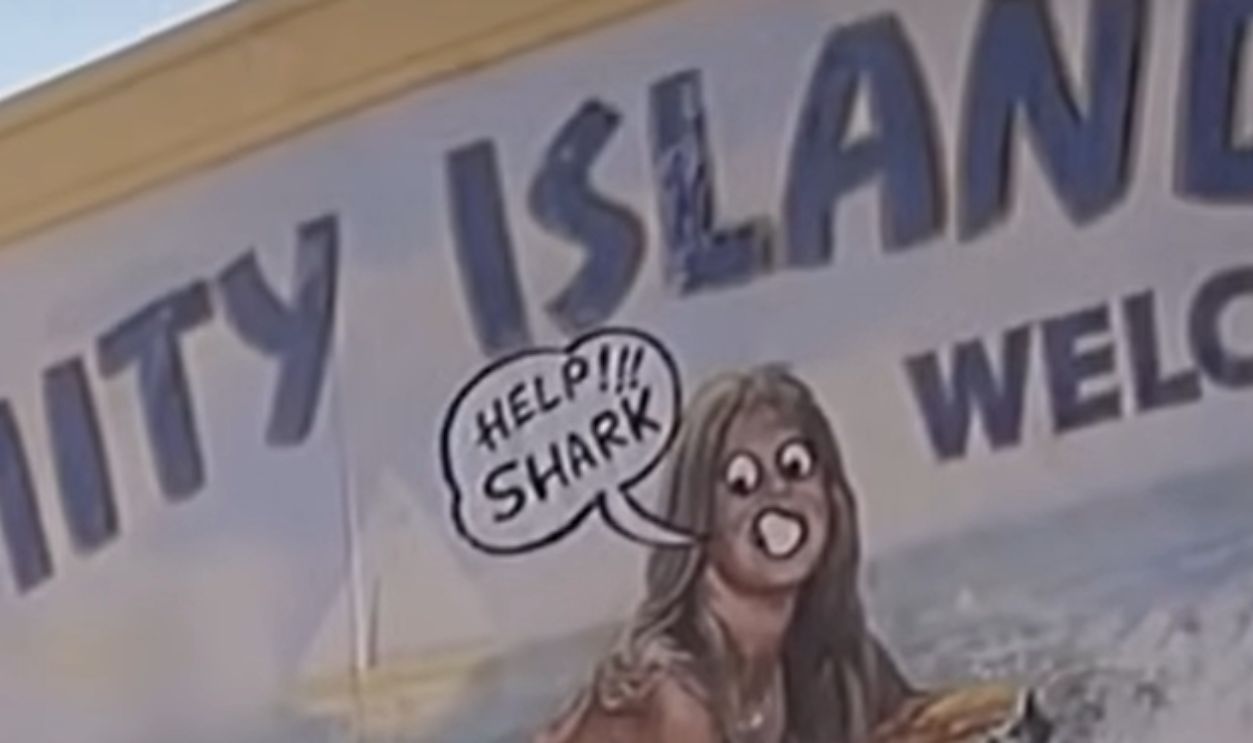 Shark Fin Painted On The Town Billboard (Cont.)