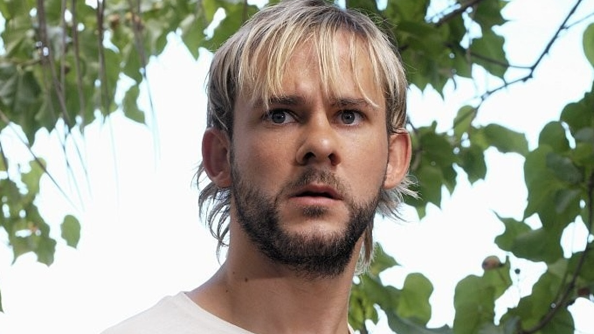 Dominic Monaghan looking at camera.
