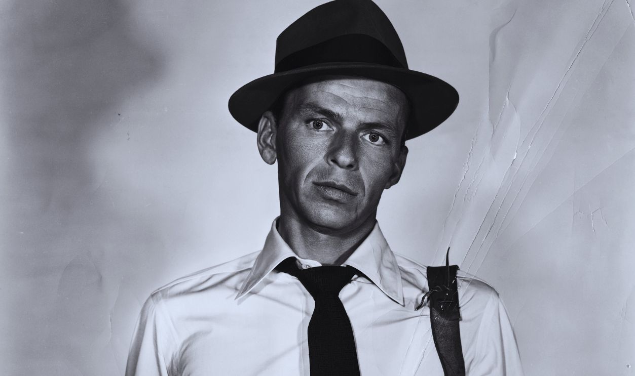 Gettyimages - 517480346, Frank Sinatra in Publicity Photo Holding Gun Publicity Photo of Frank Sinatra holding a gun as John Baron in the 1954 film Suddenly.