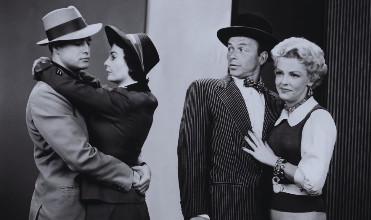 Gettyimages - 180959853, Guys And Dolls LOS ANGELES - JUNE 1963: The cast of the movie 'Guys and Dolls' (L-R) Marlon Brando, Jean Simmons, Frank Sinatra and Vivian Blaine pose for a portrait in 1955 in Los Angeles, California. 