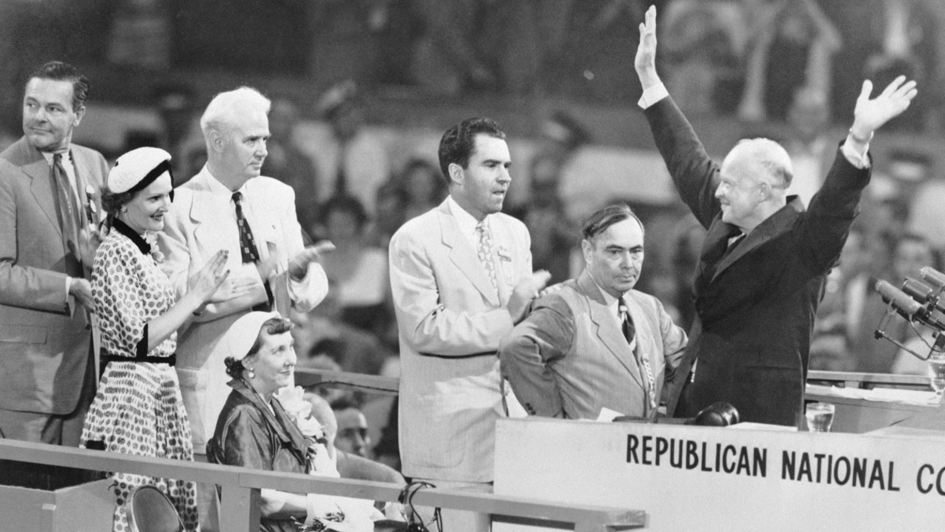 File:Dwight Eisenhower with arms raised on podium.jpg