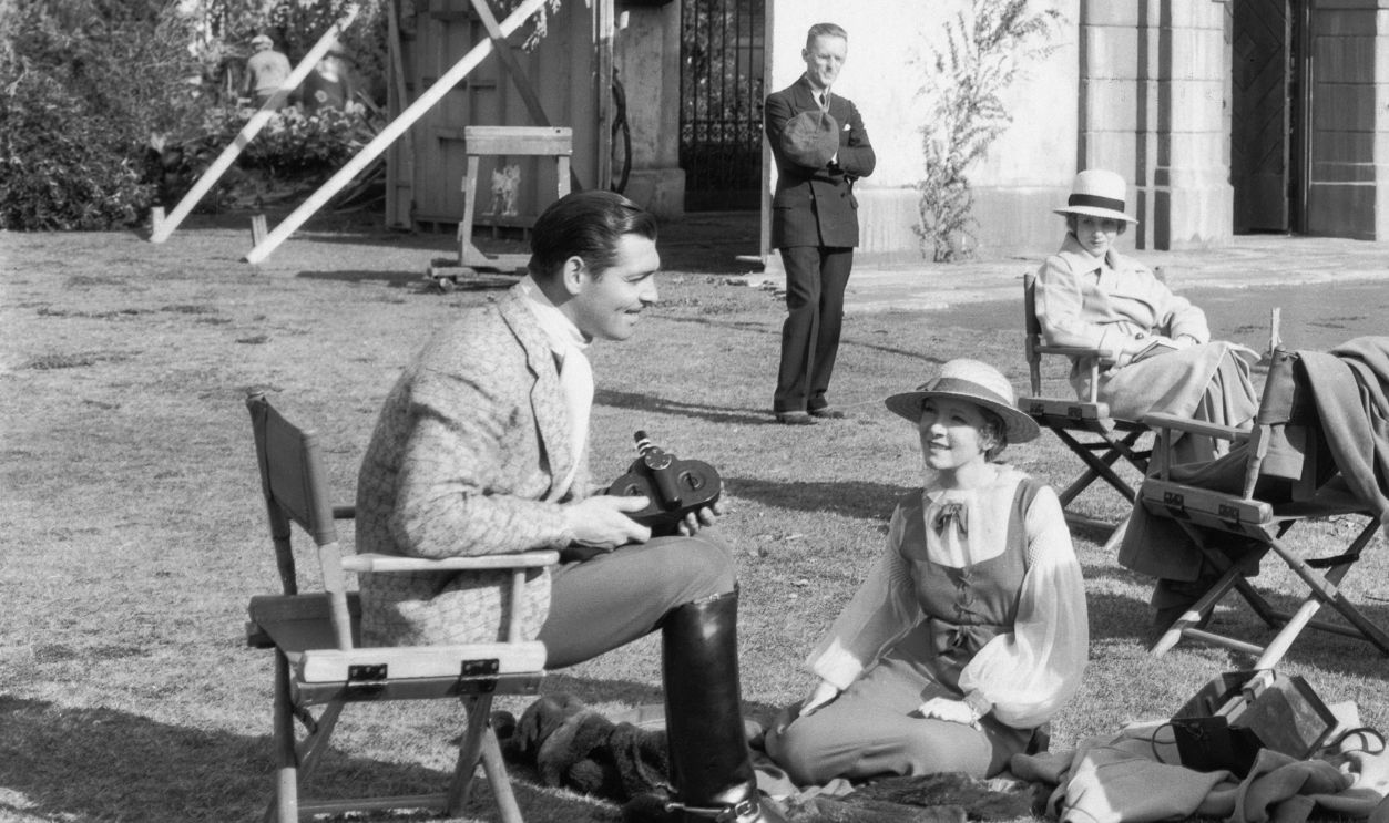 Actors Clark Gable and Helen Hayes outside the Convento di Santa Giovanna D'Aza on the set of the film 'The White Sister', 1933.