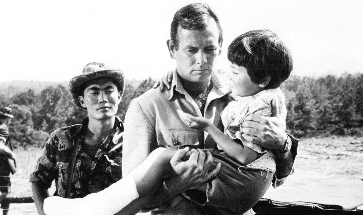 American actors David Janssen (1931 - 1980, centre), as George Beckworth, and George Takei (left) as Captain Nim, in 'The Green Berets', directed by John Wayne, Ray Kellogg and Mervyn LeRoy, 1968.