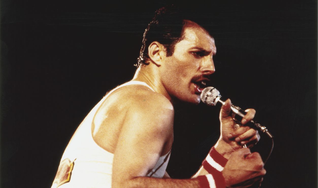 Rock star Freddie Mercury (1946 - 1991) performs with Queen at the Milton Keynes National Bowl, June 1982. 