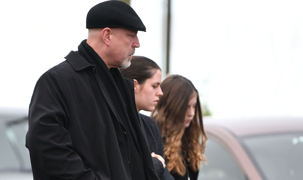 Gettyimages - 909165206, The Funeral Of Cranberries Singer Dolores O'Riordan Takes Place In Limerick LIMERICK, IRELAND - JANUARY 23: Dolores O'Riordan's ex-husband Don Burton and their children Molly Burton and Dakota attend the funeral of Dolores O'Riordan at St Ailbe's parish church in Ballybricken on January 23, 2018 in Limerick, Ireland. The Cranberries singer, aged 46 was found unresponsive in a London hotel last week. Police are not treating her death as suspicious. An inquest into O'Riordan's death was opened and adjourned until April while the coroner awaits test results. The Cranberries' debut album 'Everybody Else Is Doing It, So Why Can't We?' sold 40 million records in the early 1990's.