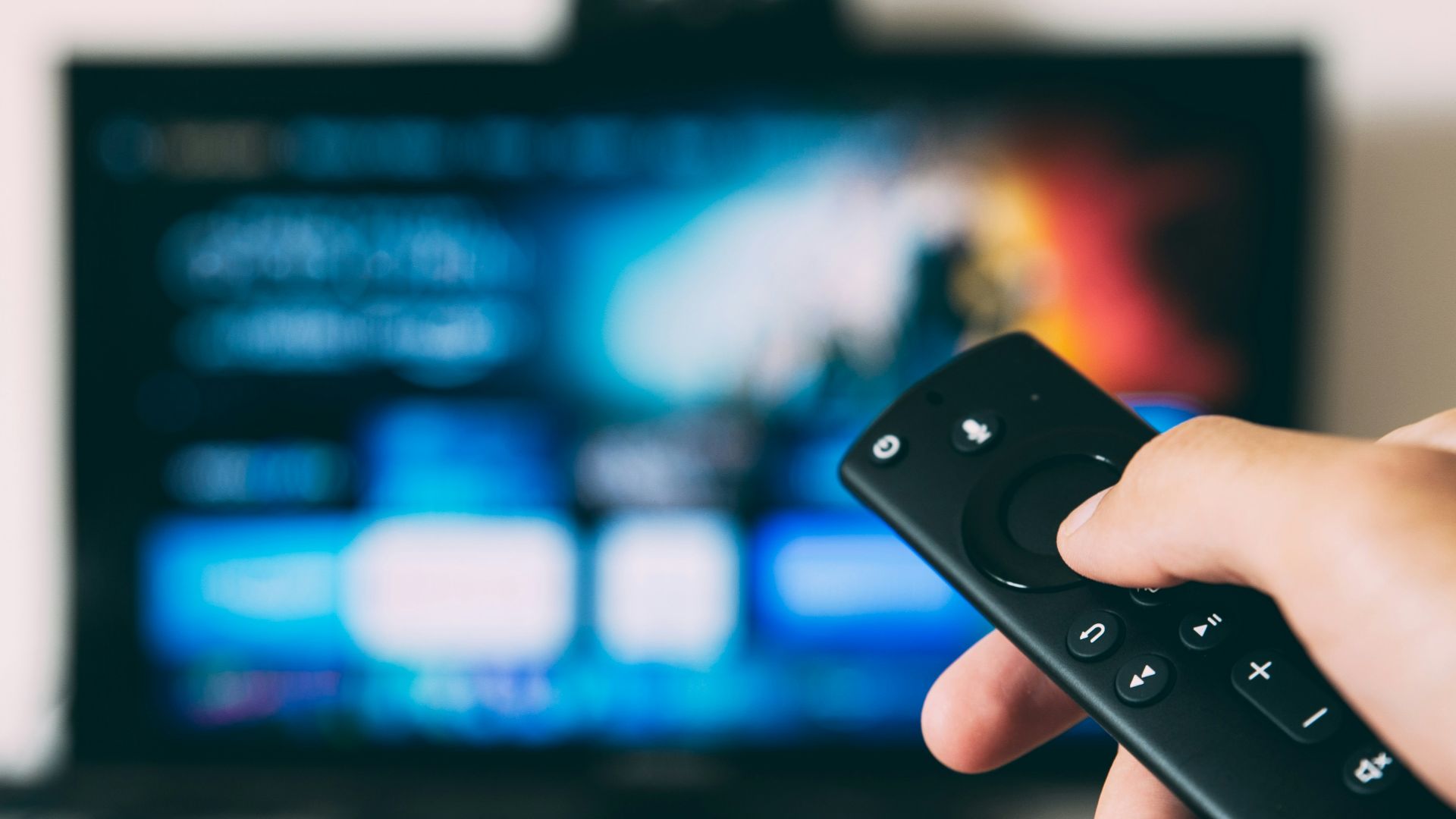 turned-on flat screen television