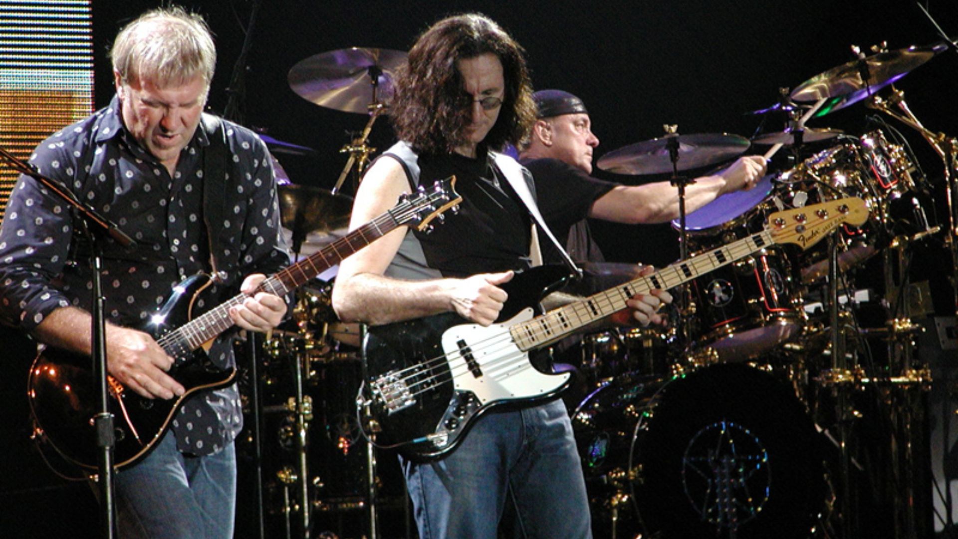 File:Rush-in-concert.jpg