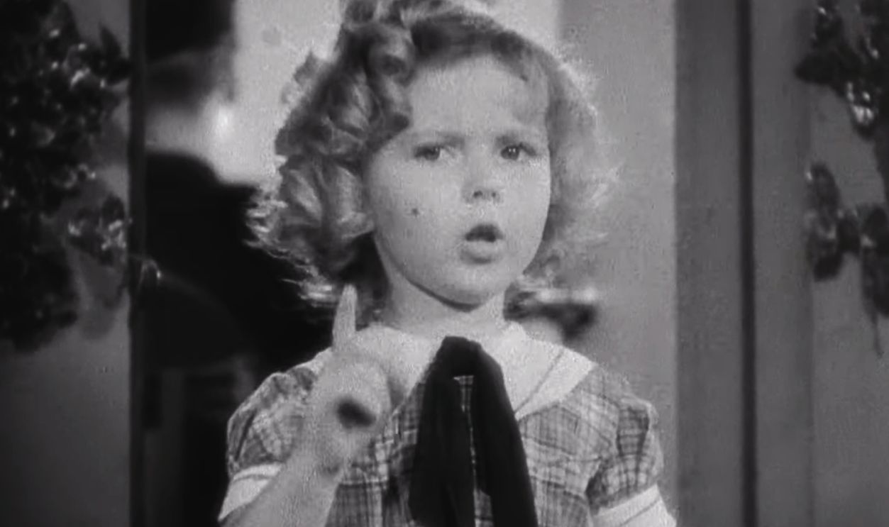 Screenshot from Bright Eyes (1934)  