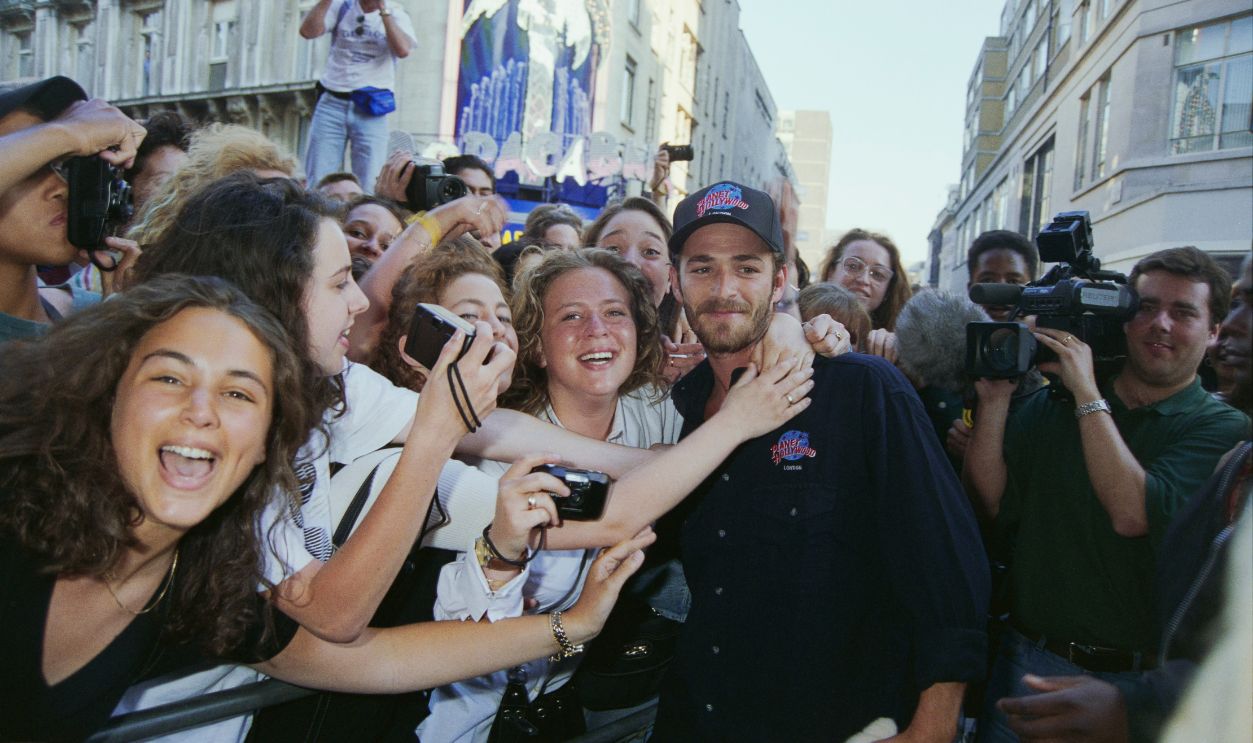 American actor Luke Perry meeting fans at Planet Hollywood, London, 27th June 1994.