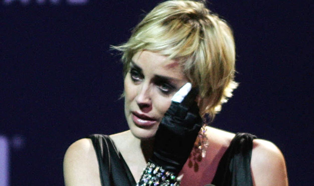 US actress Sharon Stone wipes her tears while giving a speech during the Cinema Against AIDS event, held in association with the 4th Dubai International Film Festival, in the Gulf emirate of Dubai, 10 December 2007.