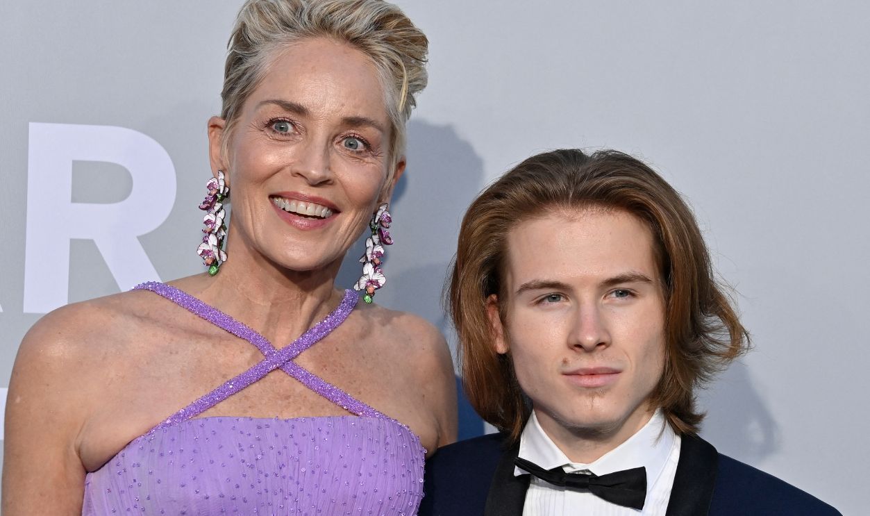US actress Sharon Stone (L) and her son Roan Joseph Bronstein arrive on July 16, 2021 to attend the amfAR 27th Annual Cinema Against AIDS gala at the Villa Eilenroc in Cap d'Antibes, southern France, on the sidelines of the 74th Cannes Film Festival.