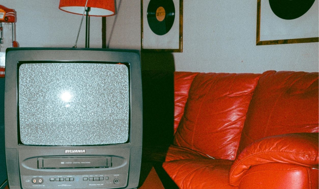 Television Beside s Red Couch
