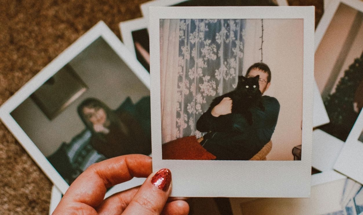 Person Holding Polaroid