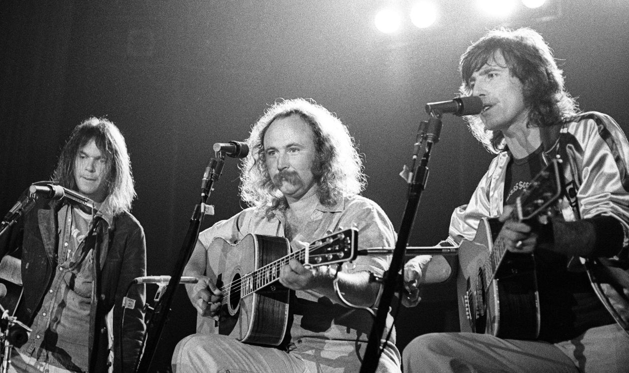Neil Young performs with David Crosby and Graham Nash as their guest at the Santa Cruz Civic Auditorium in Santa Cruz, California