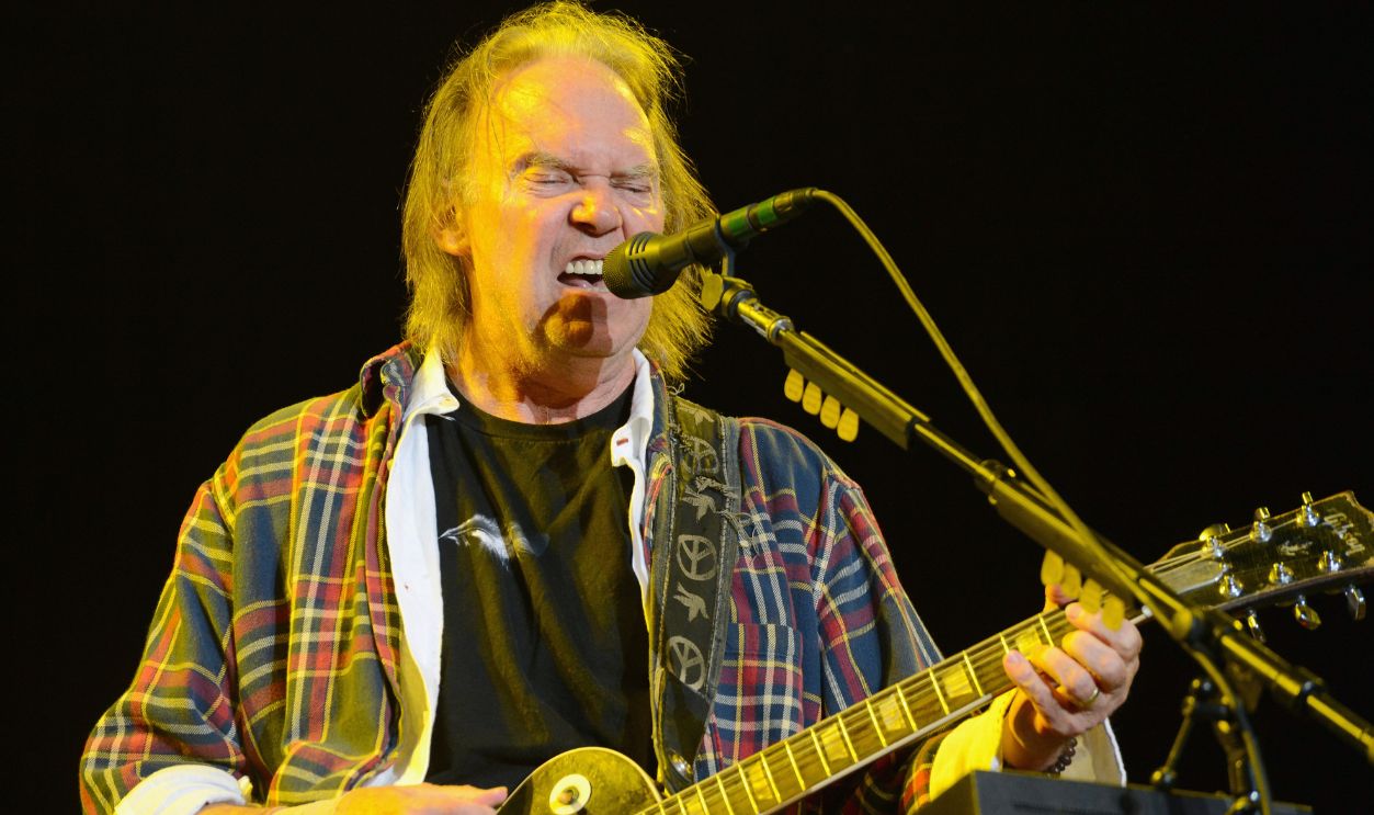 Musician Neil Young of the band Neil Young & Crazy Horse performs at the Lands End Stage during day 1 of the 2012 Outside Lands Music and Arts Festival at Golden Gate Park on August 10, 2012 in San Francisco, California.