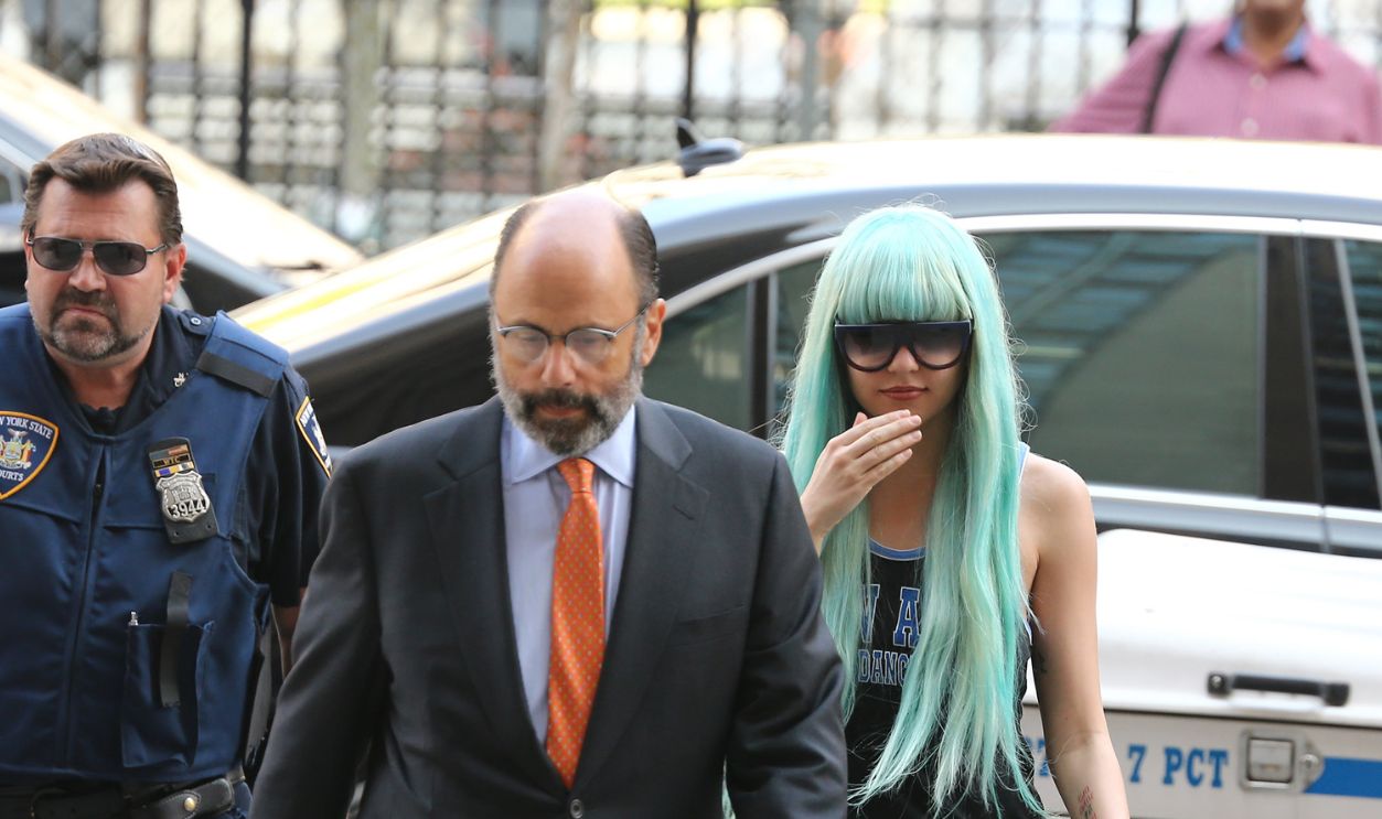 Amanda Bynes attends an appearance at Manhattan Criminal Court on July 9, 2013 in New York City. Bynes is facing charges of reckless endangerment, tampering with evidence 