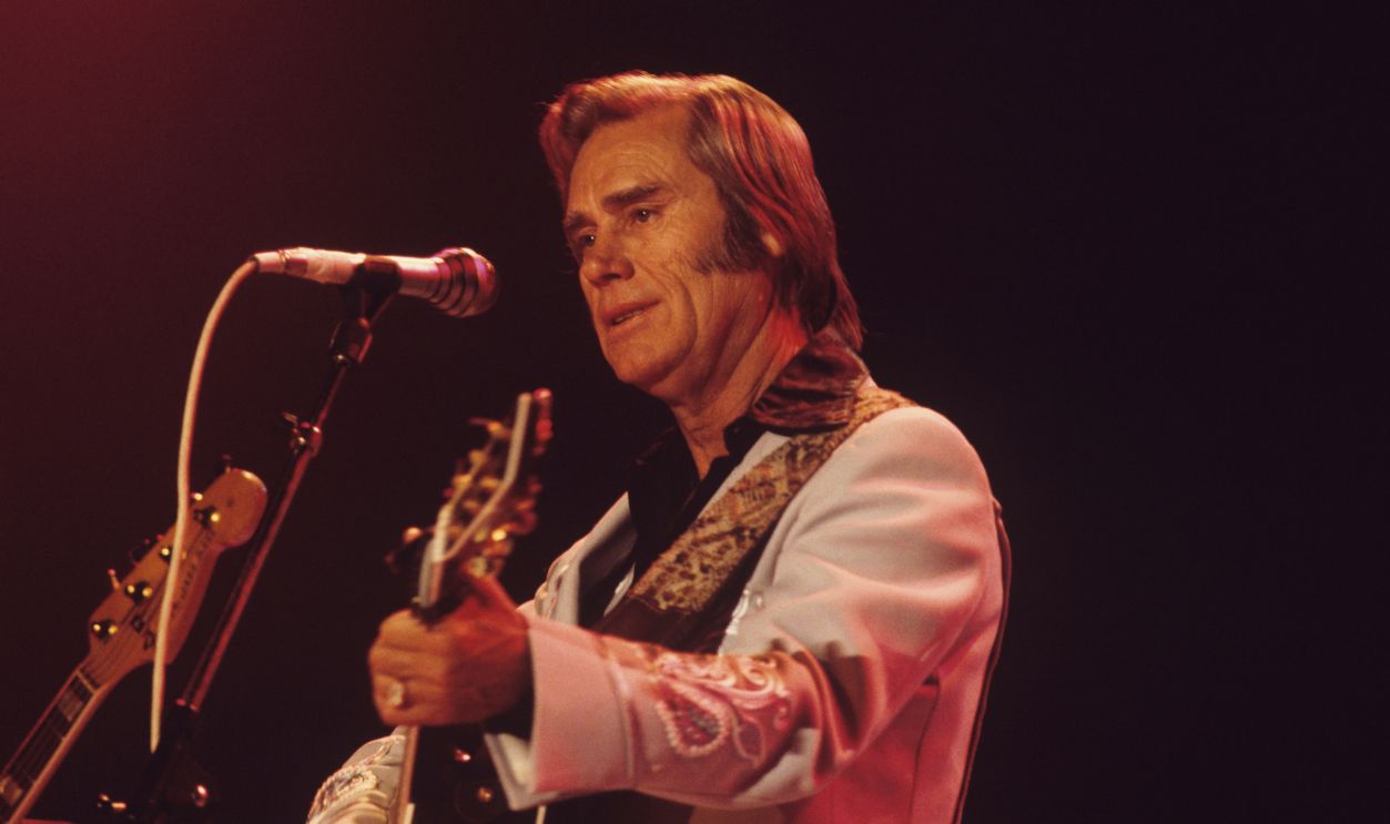 George Jones performs on stage at the Country Music Festival held at Wembley Arena, London in April 1981.