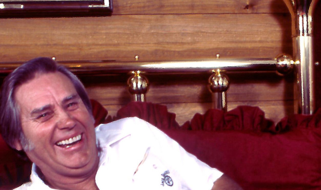 Country Music Singer George Jones on the bed in his home on January 1, 1984 in Colmesneil, Texas