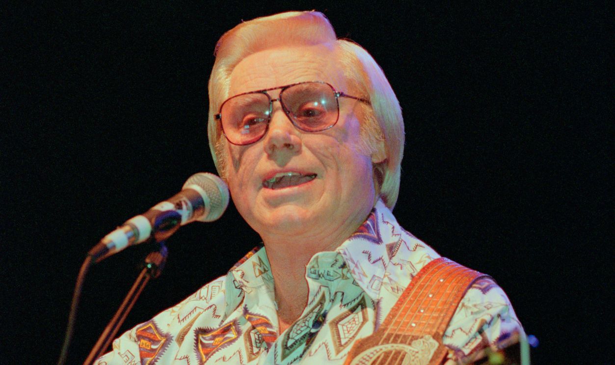 American country singer and musician George Jones (1931-2013) performs live on stage at Hammersmith Apollo in London in September 1995.