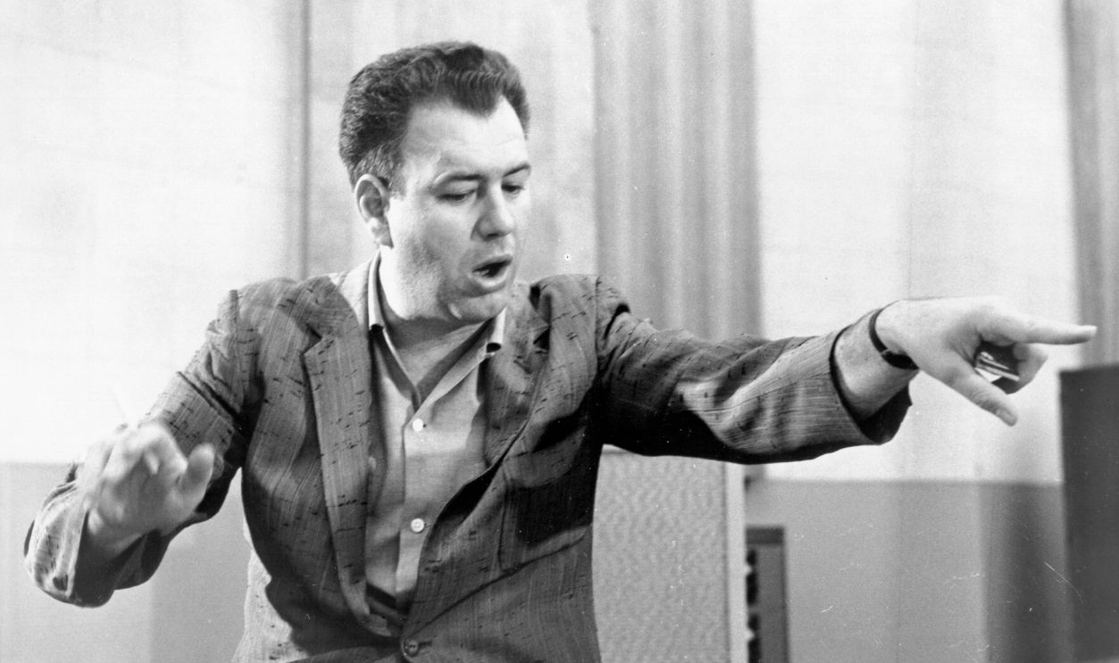 Nelson Riddle Composer and arranger Nelson Riddle conducting, circa 1955.
