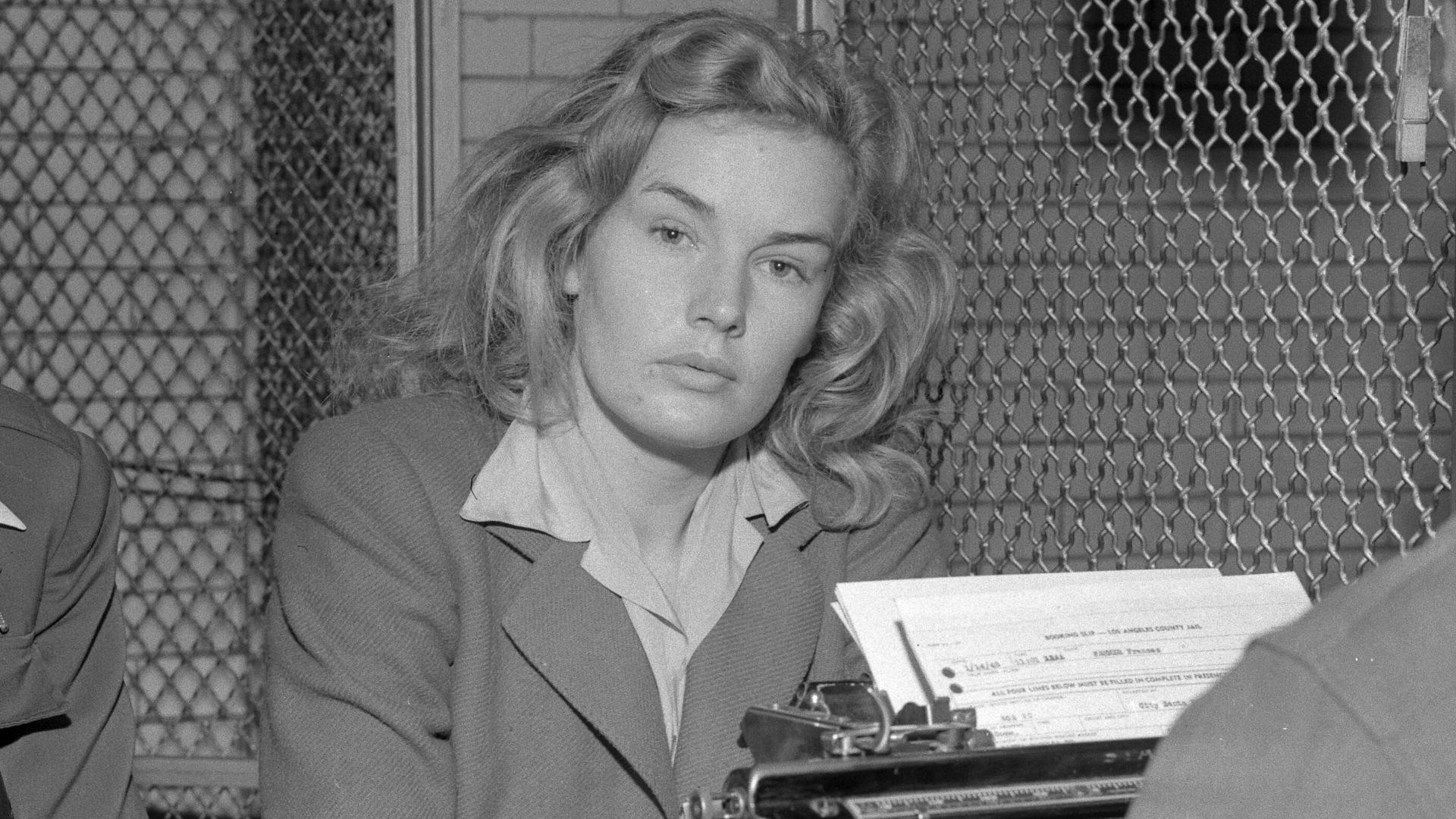 File:Frances Farmer being booked by sheriff.jpg