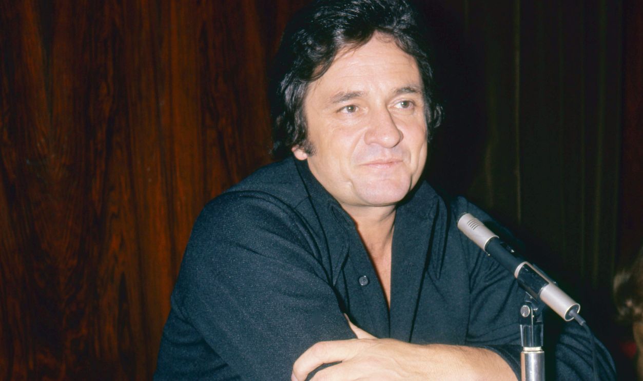 View of American Country & Folk musician Johnny Cash (1932 - 2003) during a press conference, London, England, September 26, 1972.