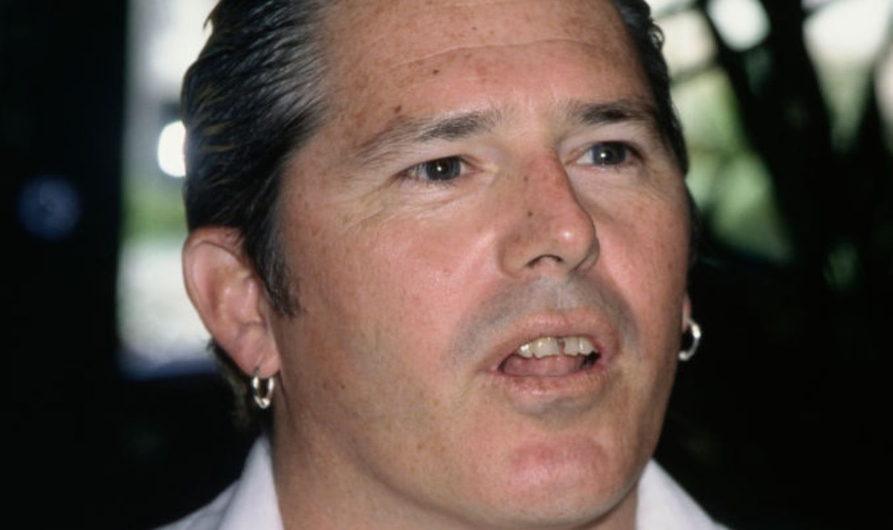 1824822235 -- American actor and musician Brandon Cruz wearing a white shirt over a white t-shirt